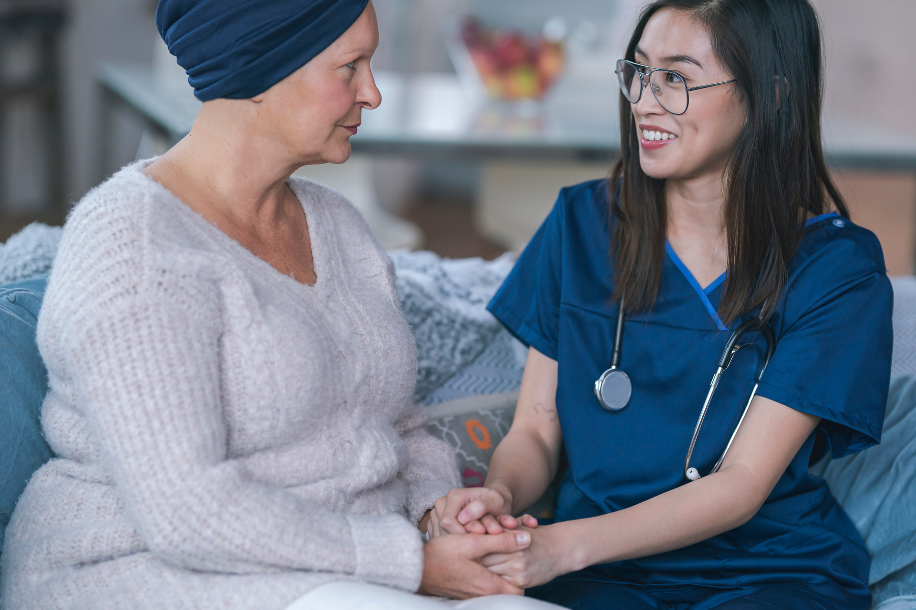 Nurse meeting with female cancer patient